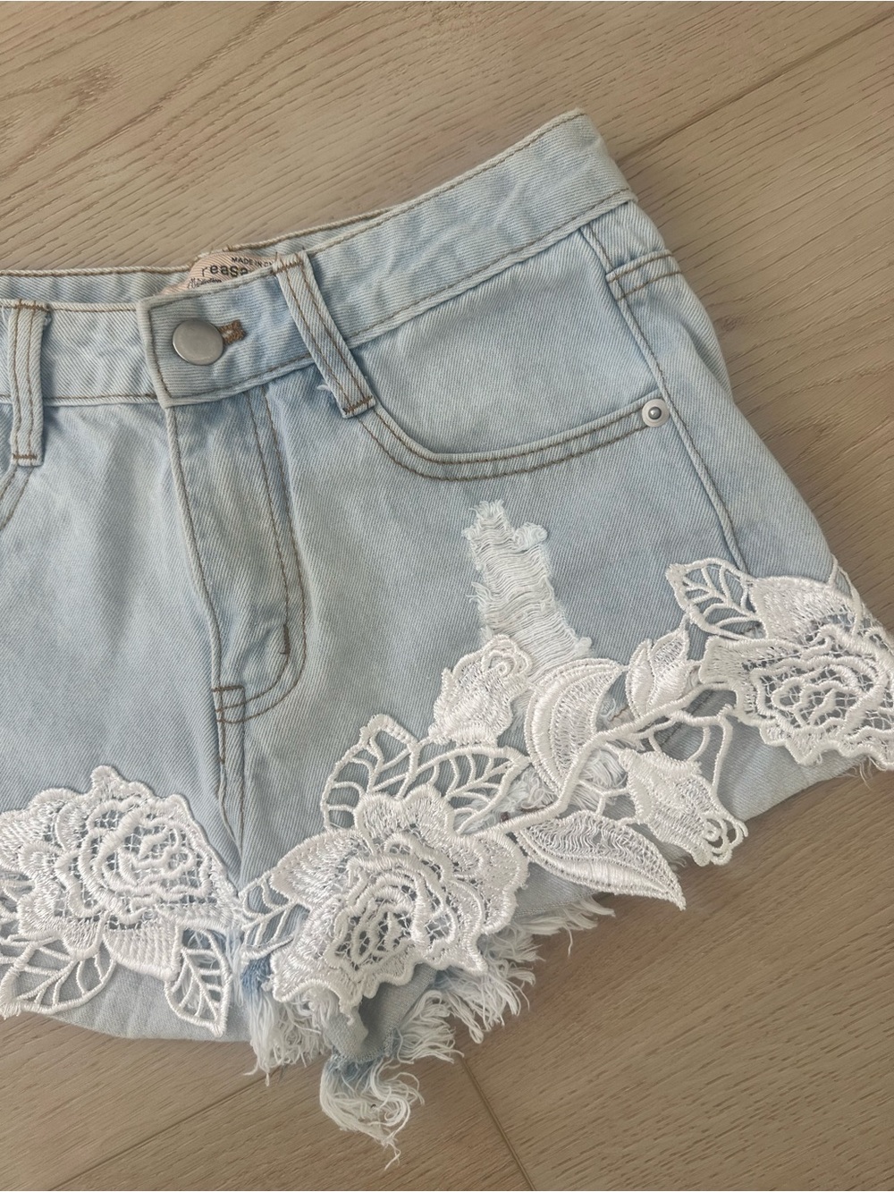 Light Blue Denim Shorts with White Lace Trim